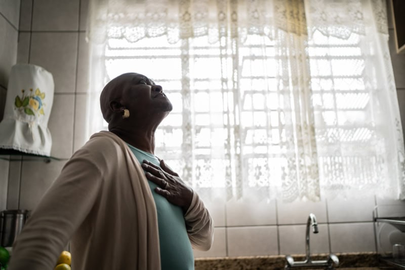 5 Ways to Improve Your Indoor Air Quality. Senior woman feeling pain at home